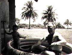 Katherine (Kat) McDougal Wheeler McCandless; Grandpa Henry McDougal; Saipan swimming pool